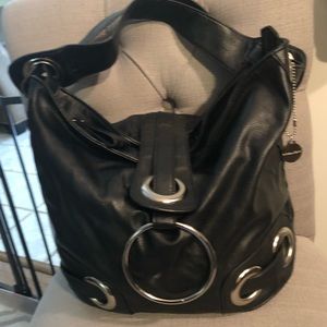 Leather purse with metal embellishments